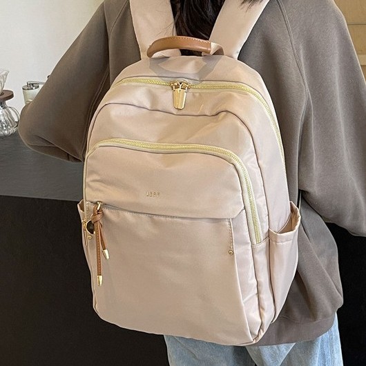 Fashionable Oxford fabric backpack for women, 2024 new large-capacity travel backpack, commuting and business 14-inch computer backpack details Picture