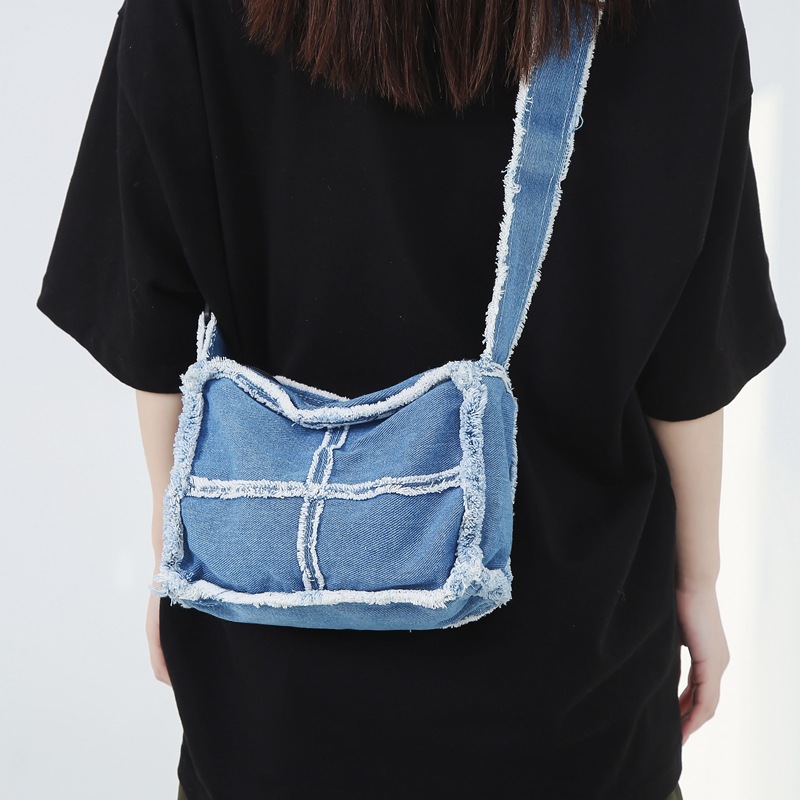 A new Japanese-style solid-color denim canvas bag for women in 2023, a casual mini mobile phone bag with washable, aged edges and a small backpack details Picture
