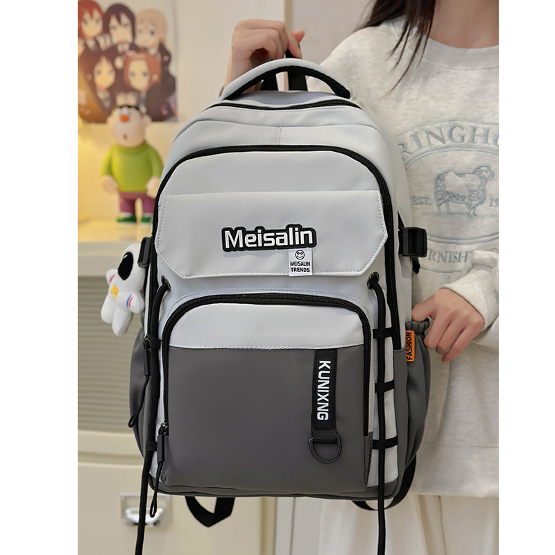 A new large-capacity schoolbag for women, a cool and trendy couple's casual backpack, and a Korean version of an Instagram computer backpack for junior and senior high school students details Picture