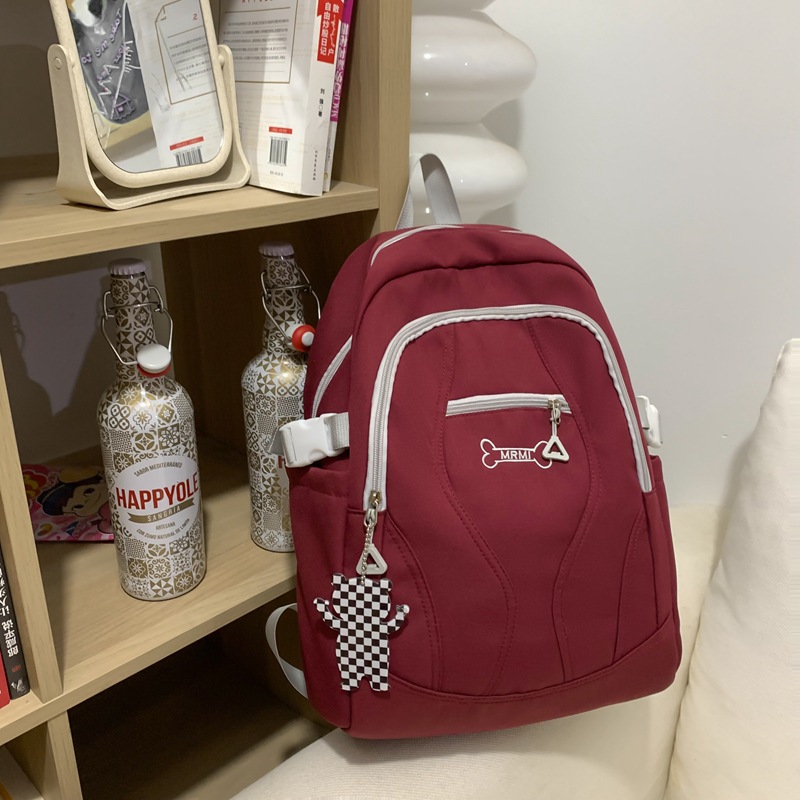 New solid-color Japanese-style backpack for male and female middle school students, large capacity, simple for high school and college students Specification drawing
