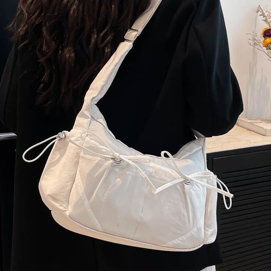 Bow-shaped lightweight nylon fabric bag for women, 2025 new crossbody bag, commuting dumpling bag, college student class bag for women details Picture