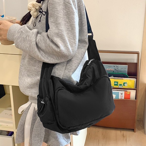 A lightweight, simple and casual women's 2024 new commuter fabric bag, solid color, multi-pocket, large capacity, single-shoulder crossbody bag for women details Picture