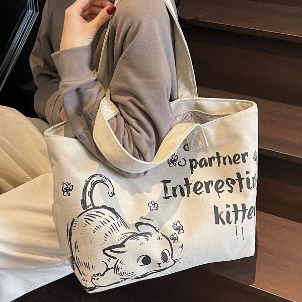 New Korean version of ins women's large-capacity canvas bag, casual cartoon shopping bag, commuting tote bag full figure