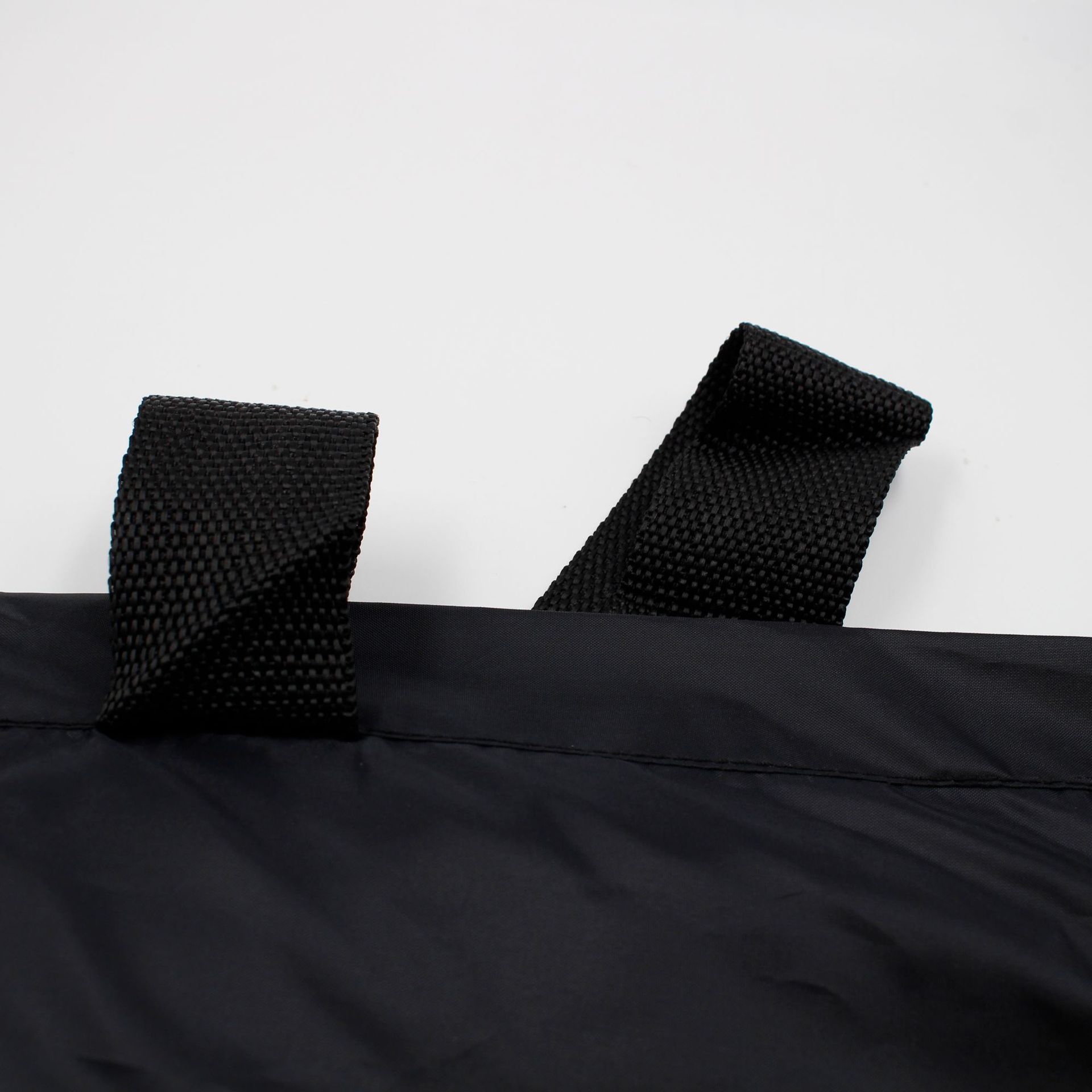 The bottom opening of the 210D black canopy tent storage bag is equipped with two hand straps Application Scenario