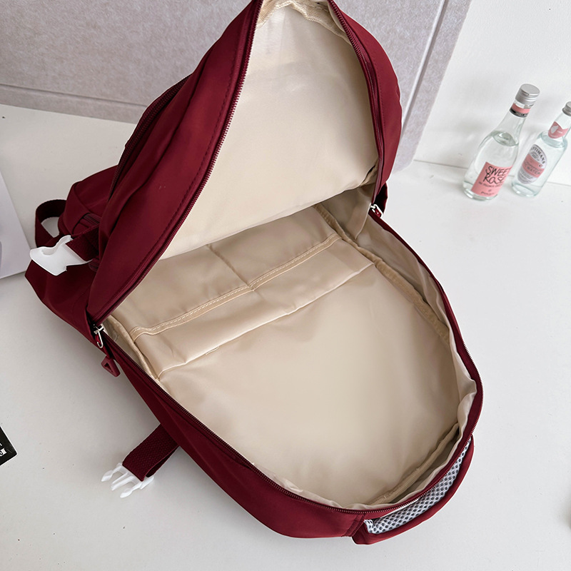 The 2024 new large-capacity backpack for high school students with multiple compartments and wide shoulder straps for primary and secondary school students is versatile for men Application Scenario