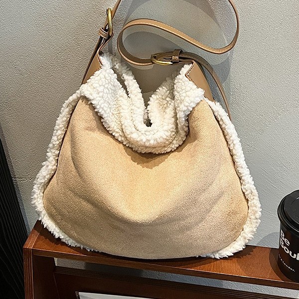 A new versatile single-shoulder bag for autumn and winter, featuring a laid-back and fashionable style for girls. It's a bucket bag with a large capacity and a cute crossbody bag Specification drawing