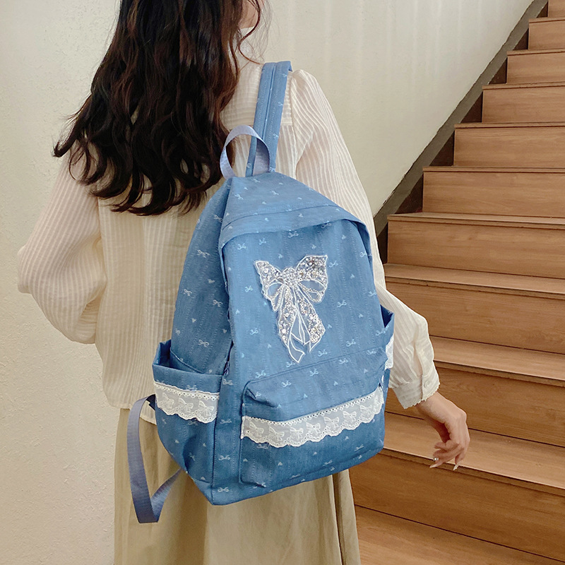 A new Japanese-style niche butterfly double-shoulder junior high school backpack with large capacity 2025 for casual and fashionable college students going out full figure