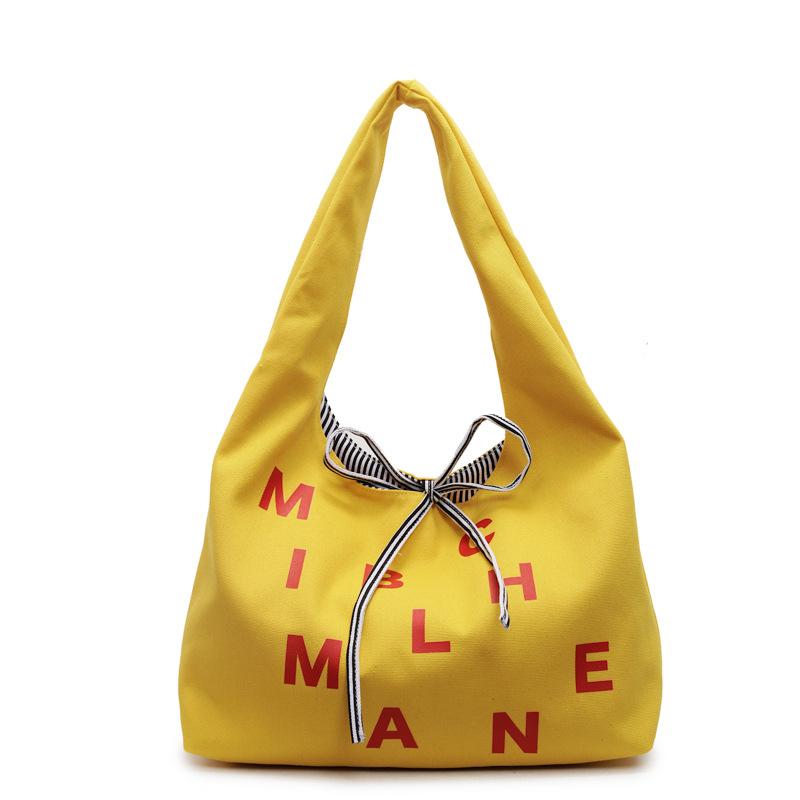 Large-capacity color-blocking striped double-sided canvas bag, 2025 new style color letter bow shopping bag, single-shoulder bag Item Picture