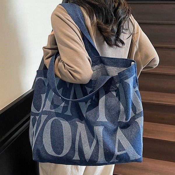 A trendy and fashionable new large-letter denim tote bag, a laid-back single-shoulder bag, and a casual hand-held shoulder bag Application Scenario