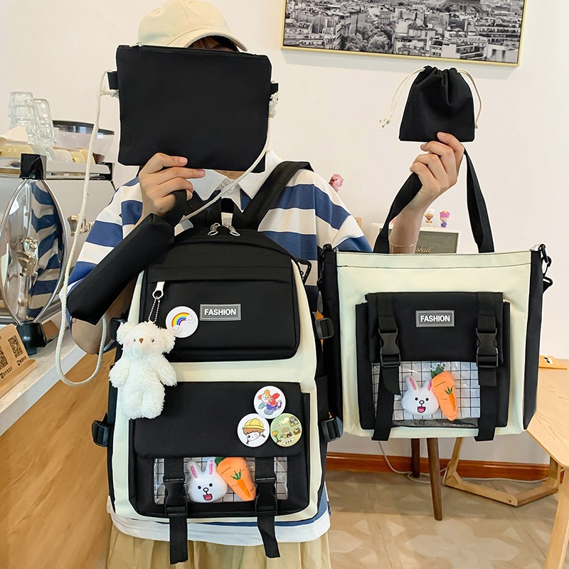 New large-capacity five-piece Korean version children's backpack and backpack for grades three to five and six full figure