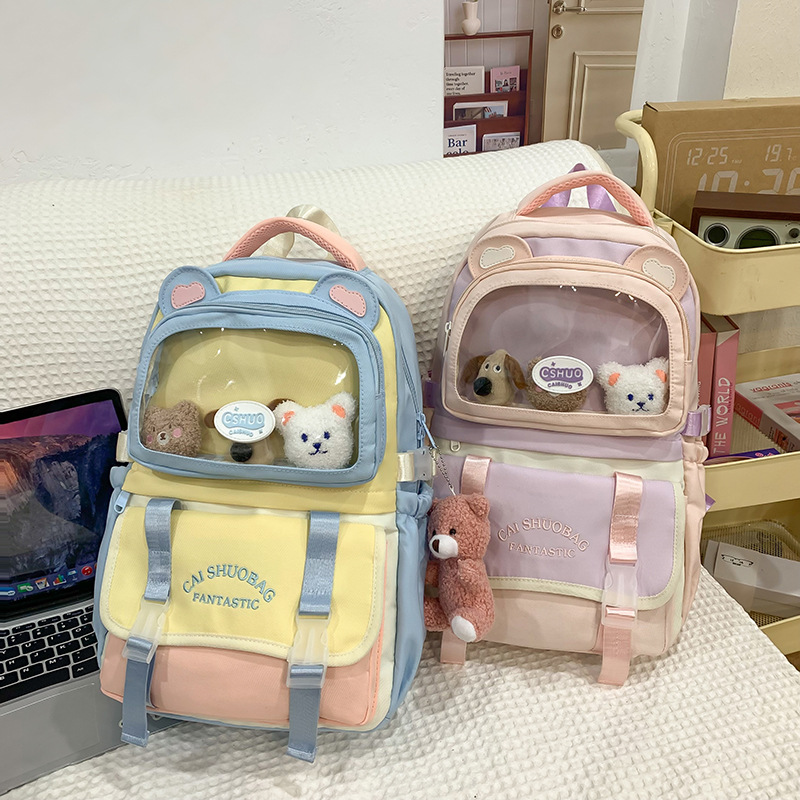 A fresh and simple color-blocking pain bag with large capacity, casual and lightweight student backpack, an Instagram Korean version cute backpack for girls full figure