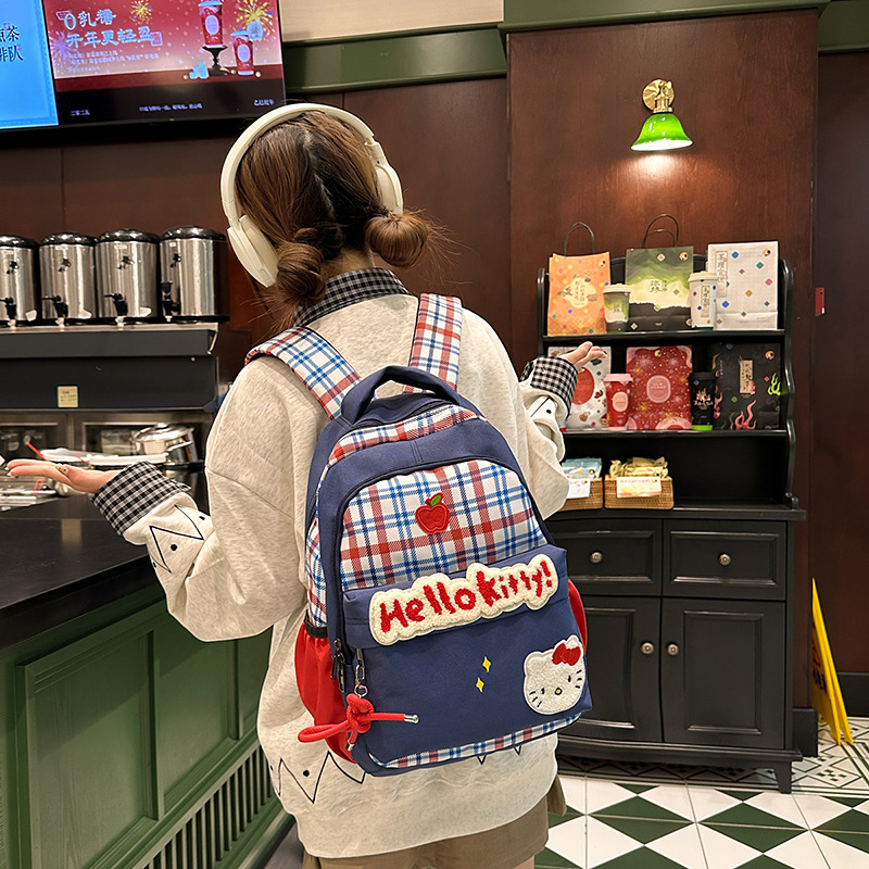 Retro checkered backpack, cute cartoon cat bag for female college students, casual large-capacity lightweight schoolbag wholesale full figure