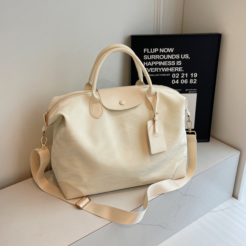 Large-capacity travel bag for women, large business trip bag, fashionable yoga and fitness bag, short-distance airplane carry-on luggage bag full figure