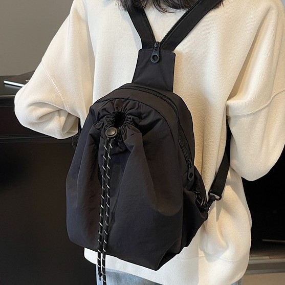 Trendy, classic and elegant crossbody bag, fashionable commuting travel shoulder bag, lightweight solid color drawstring, versatile mini backpack Application Scenario