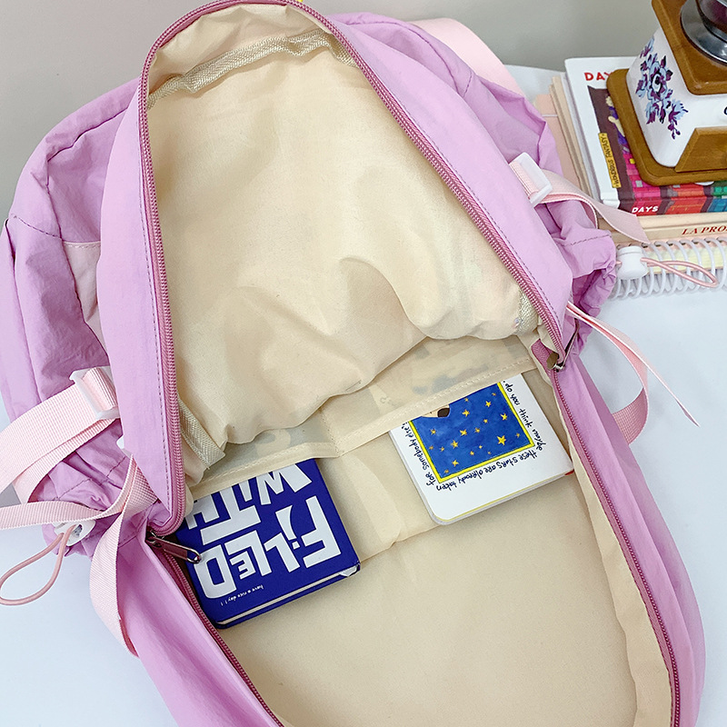 College-style large-capacity color-blocking schoolbag for junior high school students, girls' high school students' fresh and clean backpack, and cute backpack for young girls Application Scenario