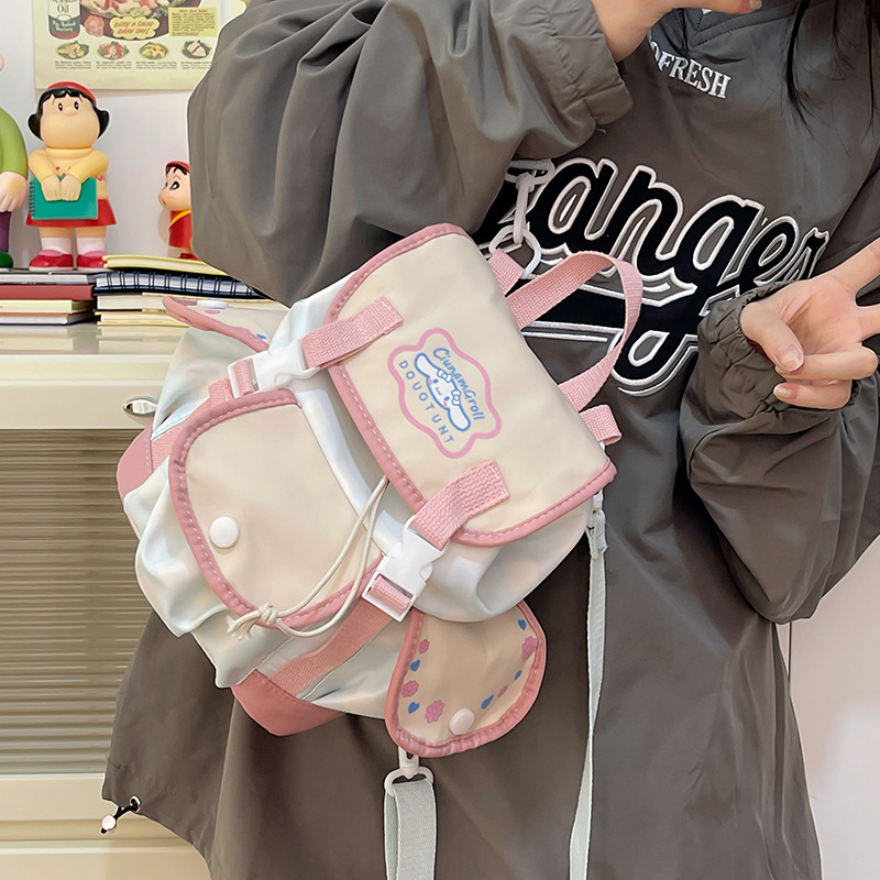 The new Korean donut big ear collaboration backpack, primary school schoolbag, girls' crossbody bag, and mini bag of cinnamon dog details Picture