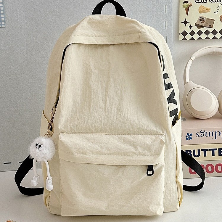 A cute student macaron letter backpack for casual students on Instagram. It's a simple, trendy and fresh backpack details Picture