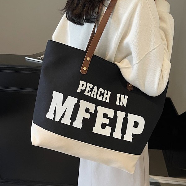 New autumn and winter style large-capacity canvas bag with European and American letters, a student hand-held class tutorial bag, fashionable and casual single-shoulder details Picture