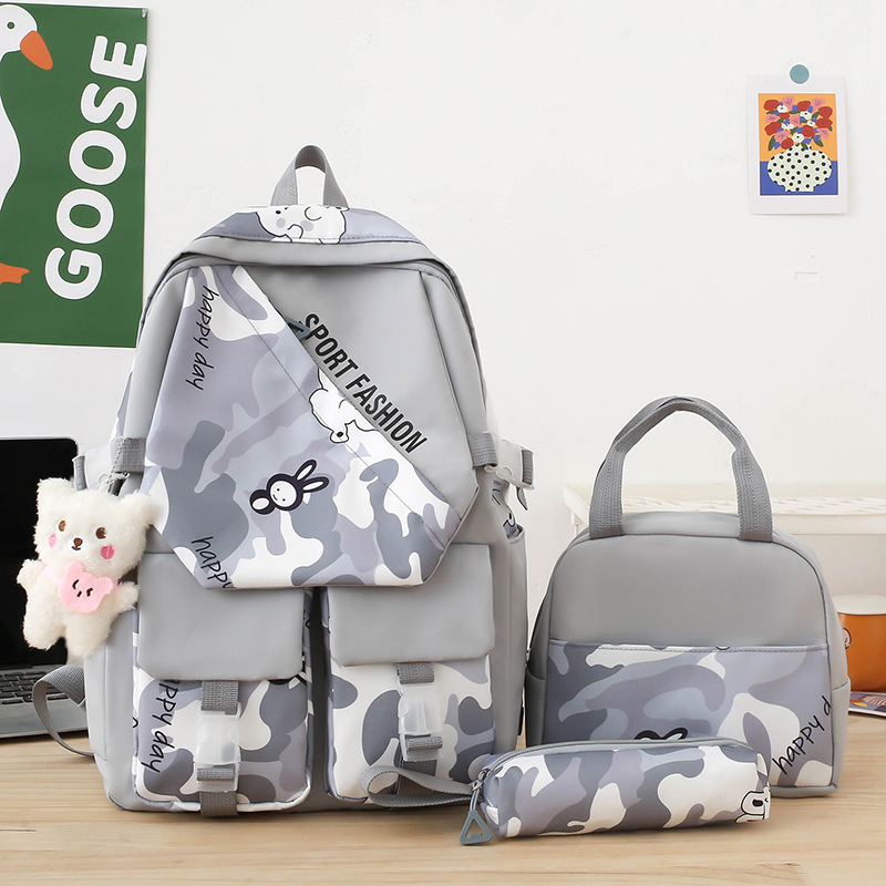 New fashionable cartoon backpack for women, Korean version, large-capacity student schoolbag set, three-piece nylon casual backpack Application Scenario