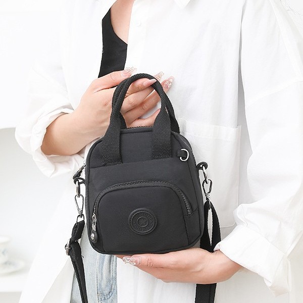 Nylon fabric bag 2025 Spring New hand-held women's bag, cross-border trend, women's casual mom bag, single-shoulder crossbody bag details Picture