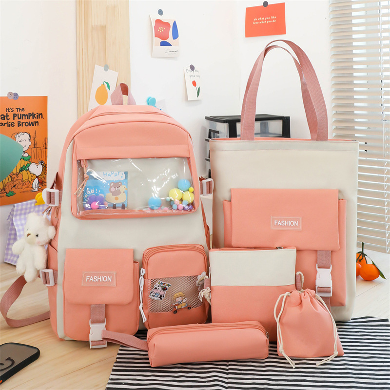New large-capacity student schoolbag, Korean version Harajuku four-piece canvas backpack, a lightweight backpack for middle school students on campus full figure