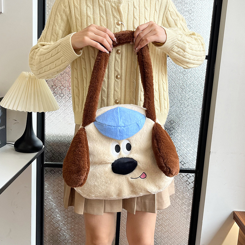 The new cartoon Boss Dog hand-held armpit bag has a large capacity and is cute and versatile. You can exchange it for a birthday gift with a claw machine doll full figure