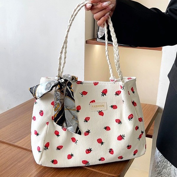 The new single-shoulder bag, tote bag, stylish printed floral corduroy hand-held women's bag, student shopping bag, bag for women full figure