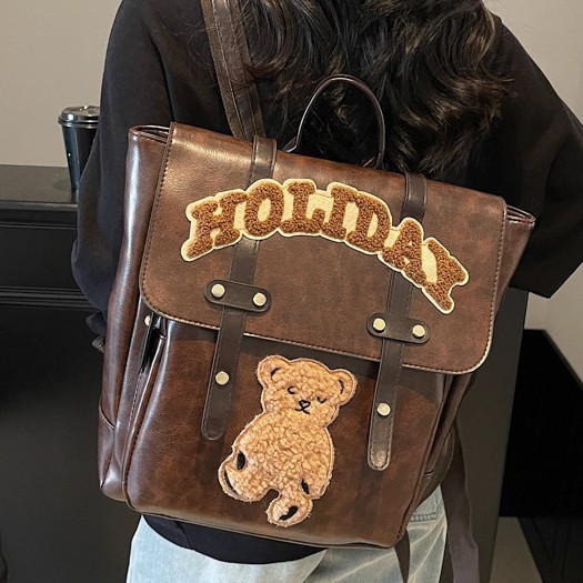 Cute little bear large-capacity backpack, student cartoon backpack, versatile for autumn and winter, college style backpack, design sense bag full figure