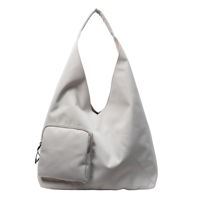 A simple Korean-style sports bag for women, a new 2025 fashionable large-capacity casual single-shoulder bag and a commuting canvas tote bag Item Picture
