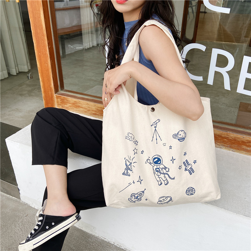 1322 Harajuku style astronaut cartoon printed canvas bag ins Soft girl college student hand-held cloth bag vest for girls full figure
