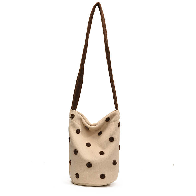 New autumn and winter niche bucket bag with a laid-back style, large-capacity women's crossbody bag, and cute polka dot student class cloth bag Item Picture