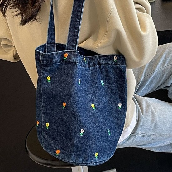 Spring new large-capacity shopping bags, niche artistic tote bags, embroidered casual and versatile hand-held denim bucket bags Application Scenario