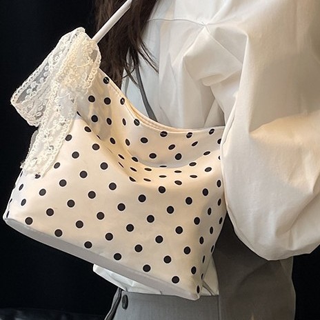 A niche design polka dot canvas bag for women, a new summer single-shoulder bag in 2025, is a super popular casual bucket bag Specification drawing
