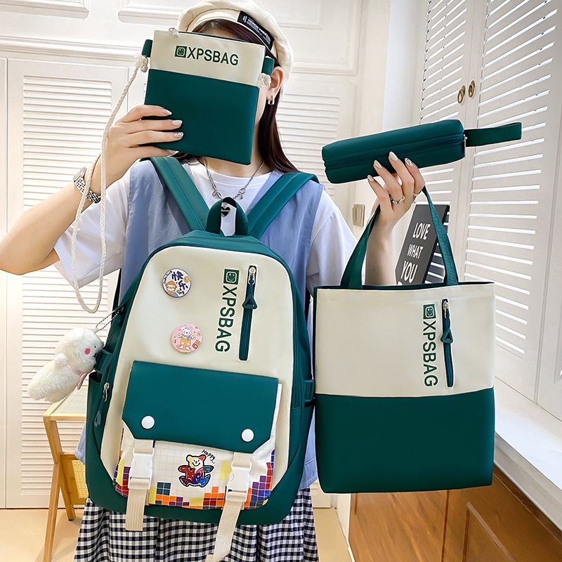 A new color-matched campus backpack set for primary school students, a large-capacity female forest-themed backpack for junior high school students, and cross-border travel full figure