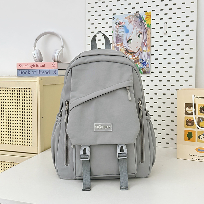 Korean-style versatile schoolbag for female students, Korean-style versatile backpack for junior and senior high school Harajuku, large-capacity solid color forest-themed backpack Application Scenario