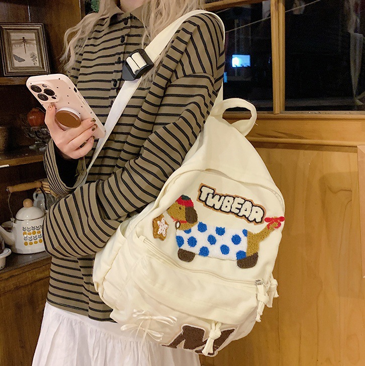 2024 New cute and highly attractive cartoon dog backpack for women, Korean-style schoolbag, commuting backpack for classes full figure