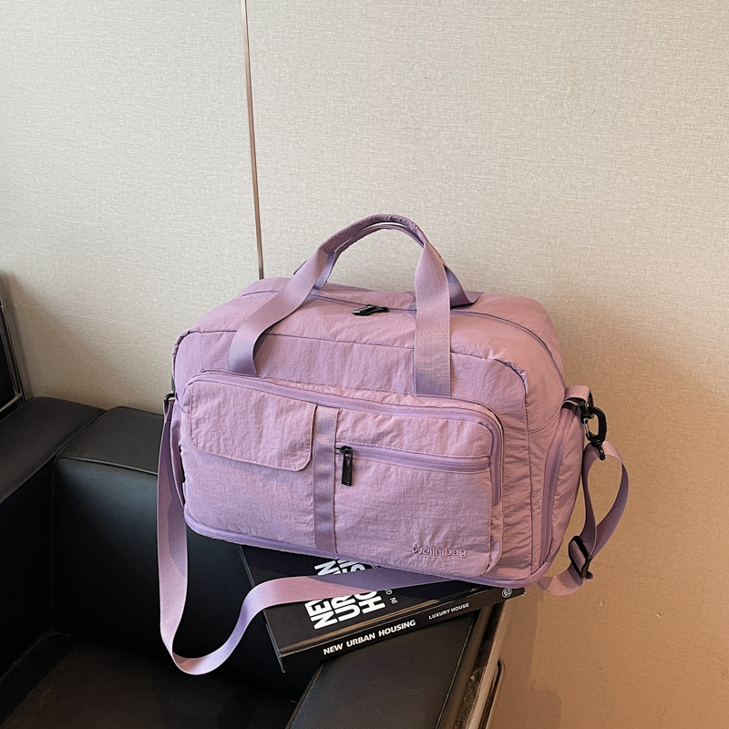 Summer 2025 expandable large-capacity business travel storage bag, hand-held waterproof short-distance travel single-shoulder handbag full figure