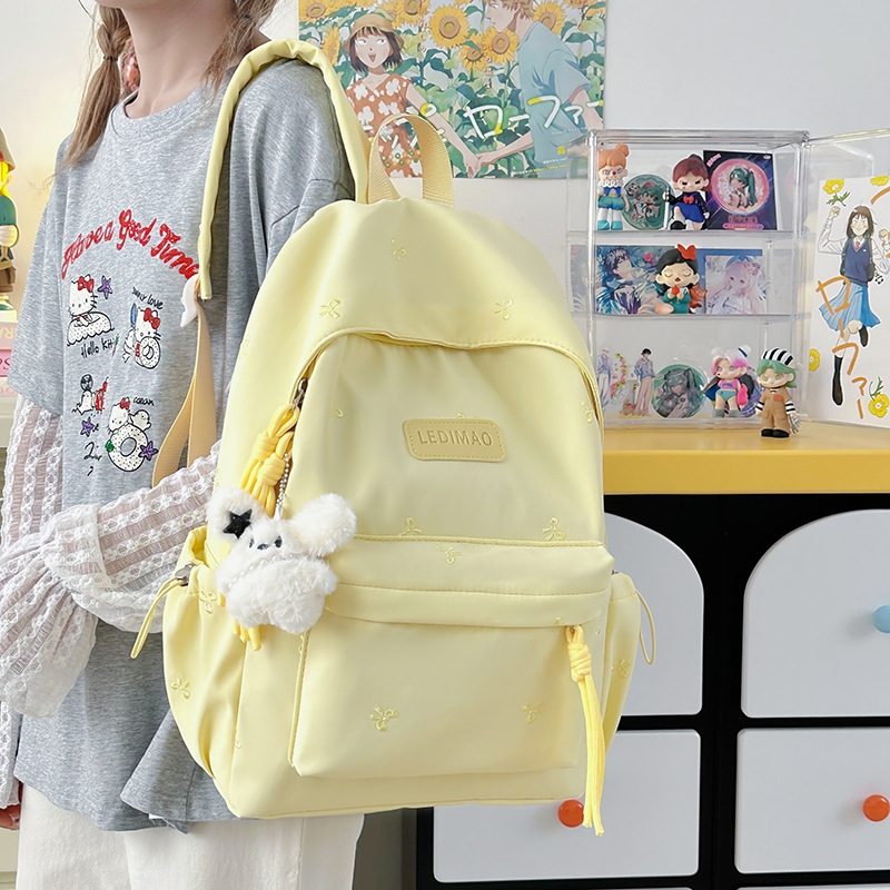 Student solid color schoolbag, high appearance level, new backpack, large capacity, simple, casual and versatile, 2025 full figure