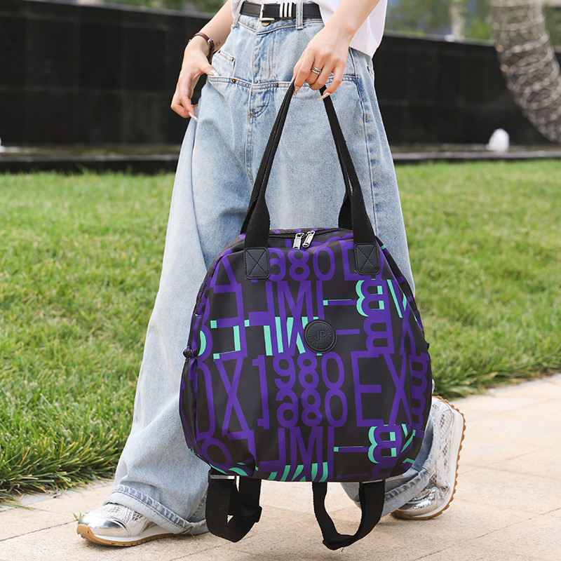 A trendy, casual, versatile and multi-functional lady's backpack for going out, a large-capacity water-resistant letter travel backpack details Picture