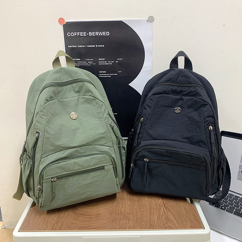 Simple outdoor travel backpack, ins women's backpack design sense, solid color backpack for junior high school, senior high school and college, men's full figure