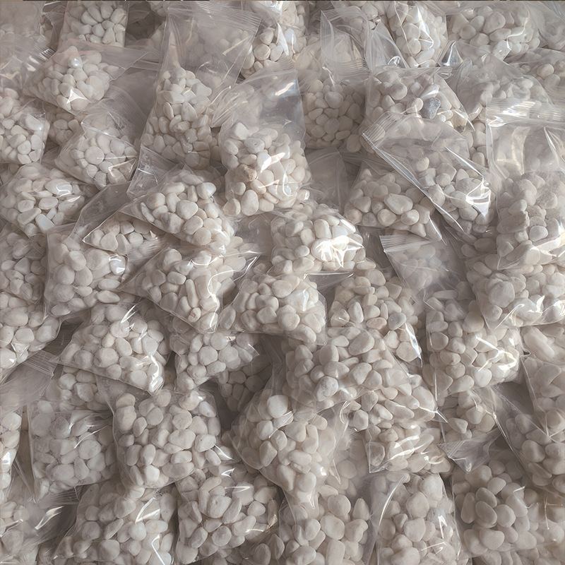 Pebbles, white pebbles, crushed stones, garden paving, courtyard decoration, white pebbles, dry landscape landscaping, white gravel details Picture