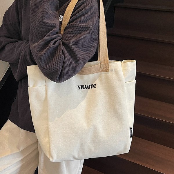 A new style of Korean-style cloth bag with a literary and artistic touch, featuring a large capacity student schoolbag and tote bag Application Scenario