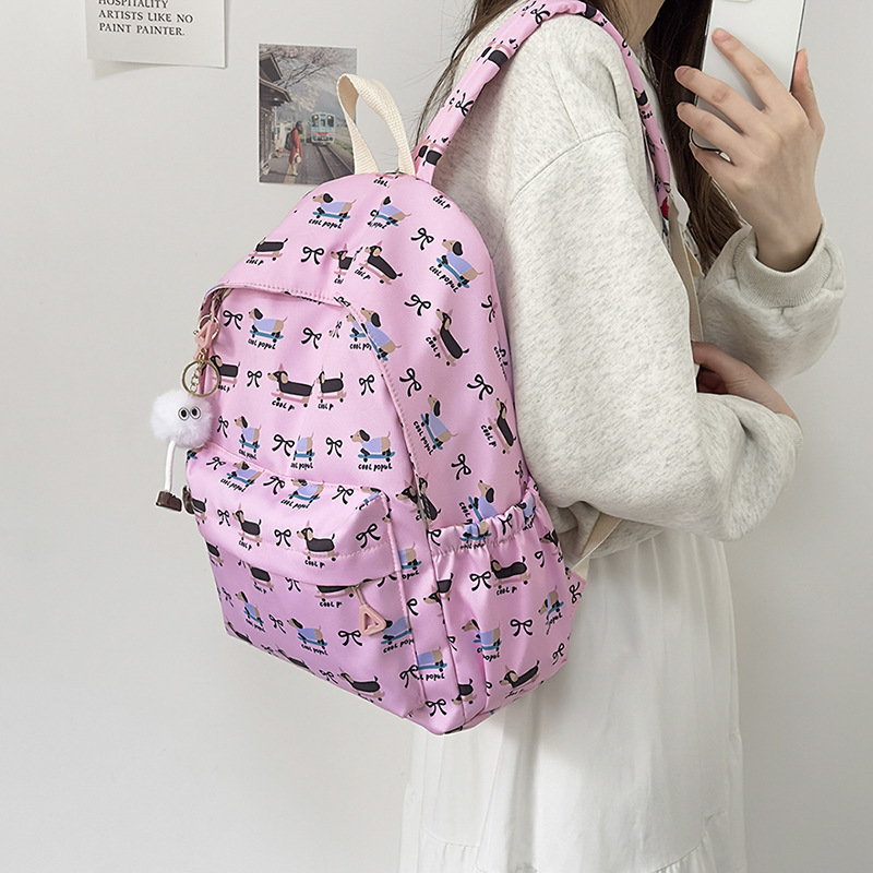 High appearance level schoolbag for girls, primary school students' graffiti travel backpack, lightweight and large-capacity backpack for girls, junior high school and senior high school students details Picture
