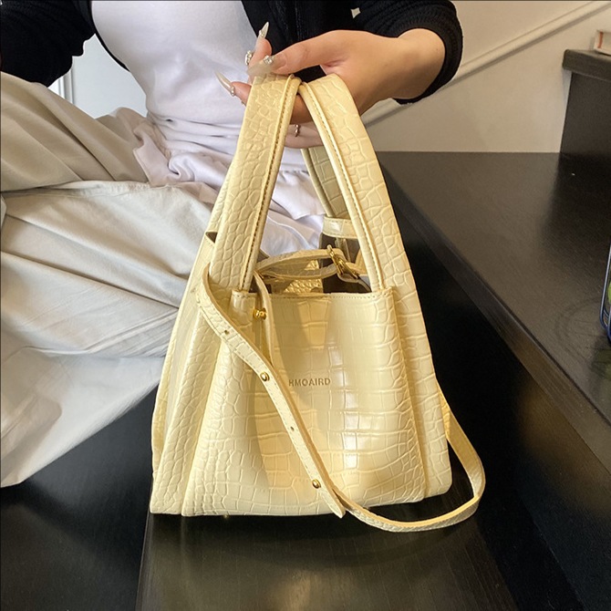 Korean style soft leather hand-held vegetable basket bucket bag for women 2025 new high appearance level niche single-shoulder crossbody bag full figure