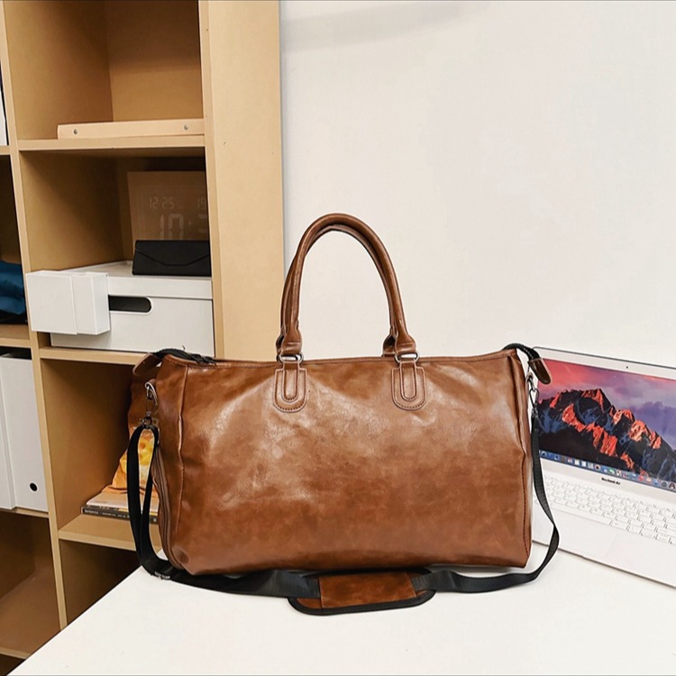 Cross-border solid-color fitness bags, neutral large-capacity crossbody sports bags, leather clothes, luggage bags, hand-held travel bags details Picture