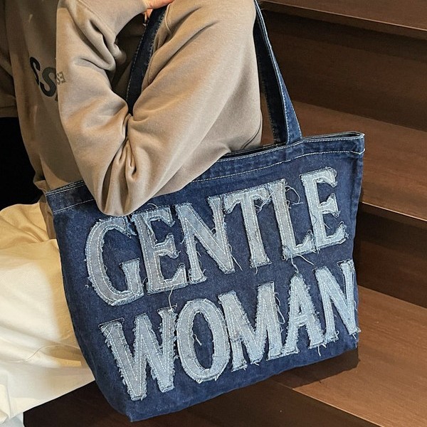 Fashionable and versatile hand-held denim tote bag with fabric fringes and letters, large-capacity single-shoulder bag, casual and cool full figure