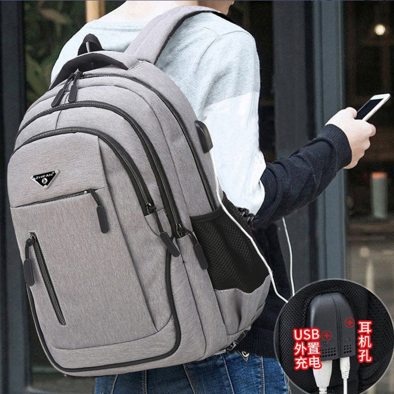 A large-capacity casual backpack with USB charging and music listening function, a business computer bag, and a men's travel bag details Picture
