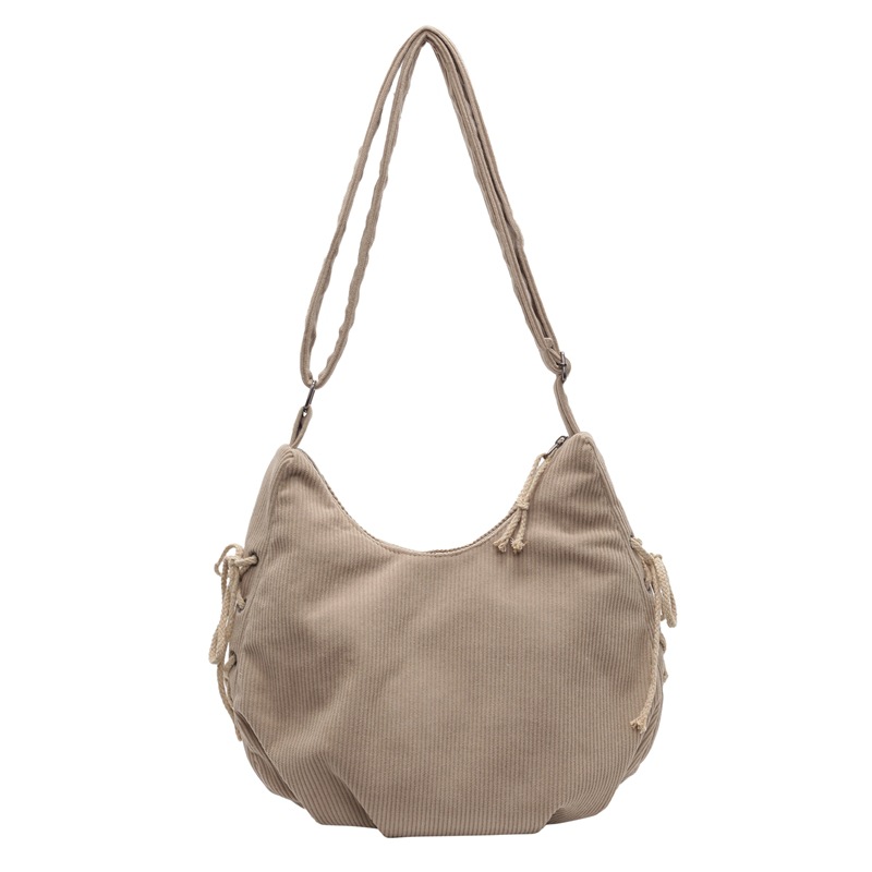 A new corduroy single-shoulder crossbody bag for autumn and winter, a fashionable commuting bag for work, and a retro and artistic forest style drawstring dumpling bag Item Picture
