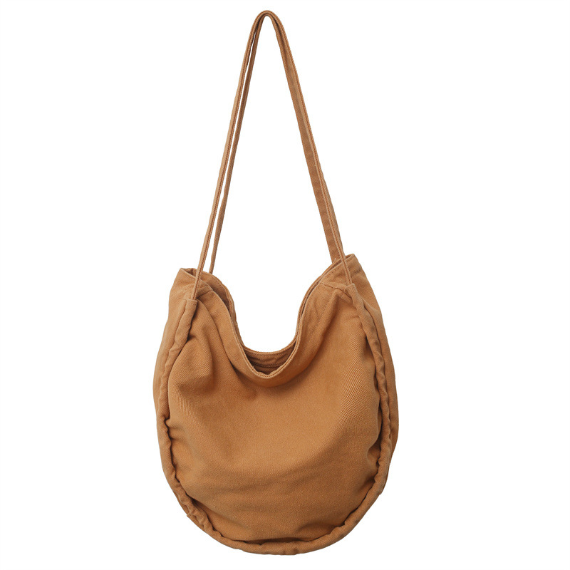 New washable canvas bag for women, ins dumpling bag, laid-back style, large-capacity tote bag, Korean version of college student class bag Item Picture