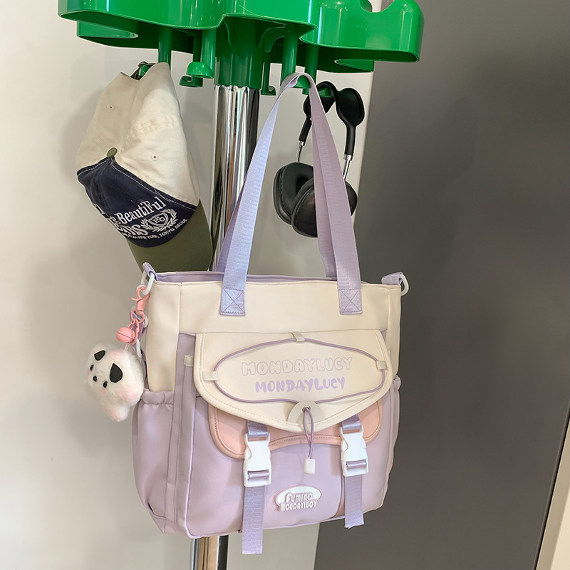 High appearance level Korean-style fresh and simple single-shoulder bag for junior high school students, color-blocking handbag, primary school student tutorial bag, canvas crossbody bag full figure